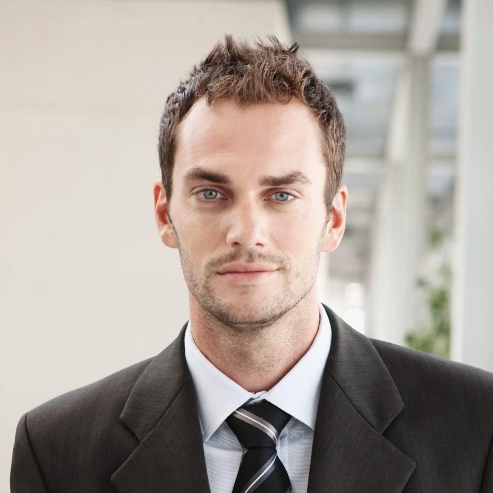 portrait-of-business-man-FKN9CNT-1-1.jpg