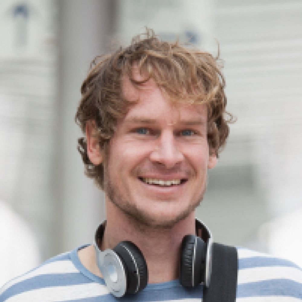 portrait-of-smiling-man-with-headphones-and-should-PFC5HDP-1-1-1.jpg